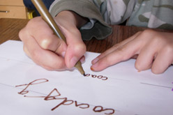 A child copying handwriting.